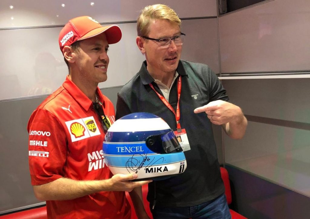 Sebastian Vettel e Mika Hakkinen